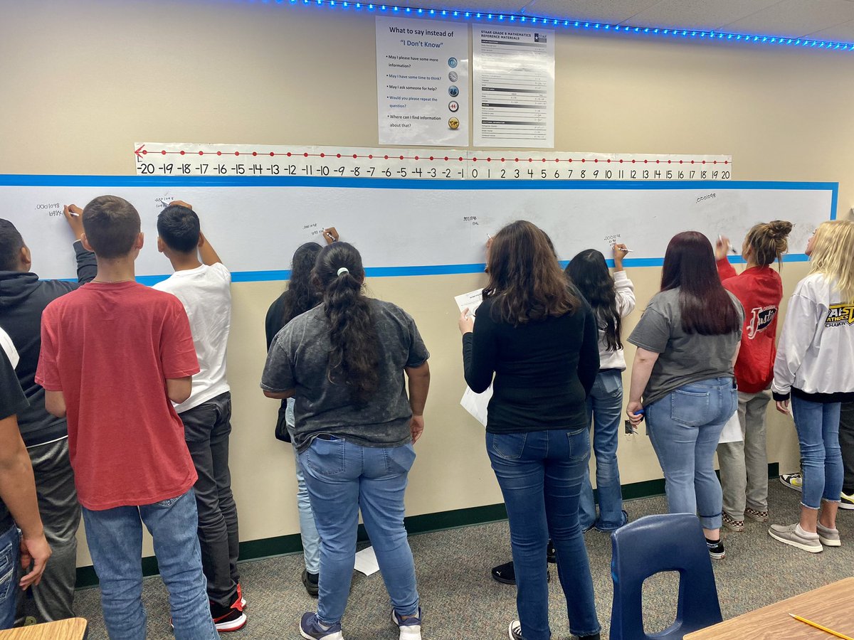 Mrs. Starks kids were participating in rally coach strategy, where partner 1 was given a number to convert to scientific notation and partner 2 would give them instructions on how to do it and coach them through the process. #moorheadfamily