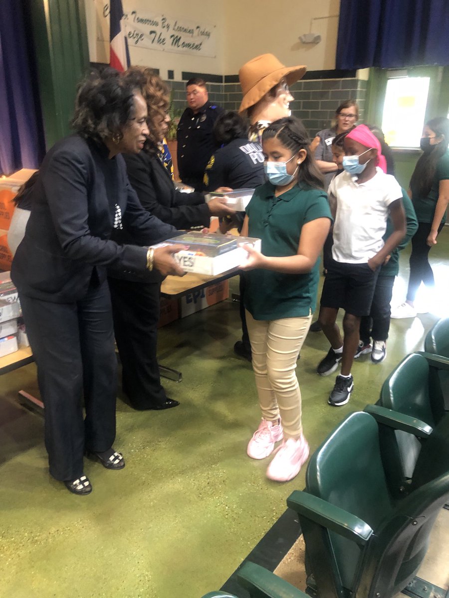 At Clinton P. Russell Elementary School for Texas Yes school supplies giveaway.   Principal Bennett and Executive Director Curry participating.