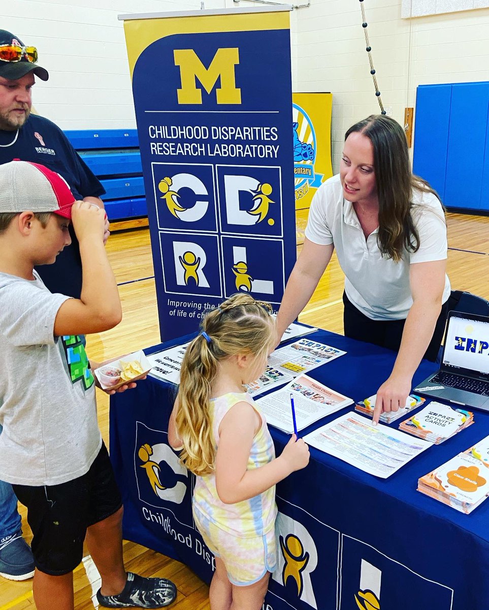 UMCDRL's tweet photo. UMCDRL member @beemer_lexie at the North Elementary Health Fair sharing information with children and families about #InPACTatHome and #InPACTatSchool. #LetsMoveMichigan https://t.co/yZxdQKheTG