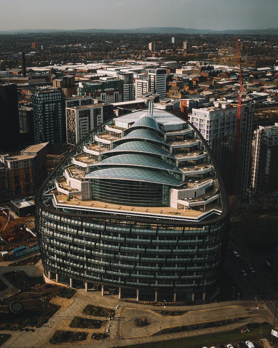 We couldn't let #WorldPhotographyDay pass without a picture of One Angel Square 💙 🏠 The building is home to our support centre colleagues and is one of the most sustainable large buildings in Europe. 📷 Photo: coop.uk/3QWDTZi