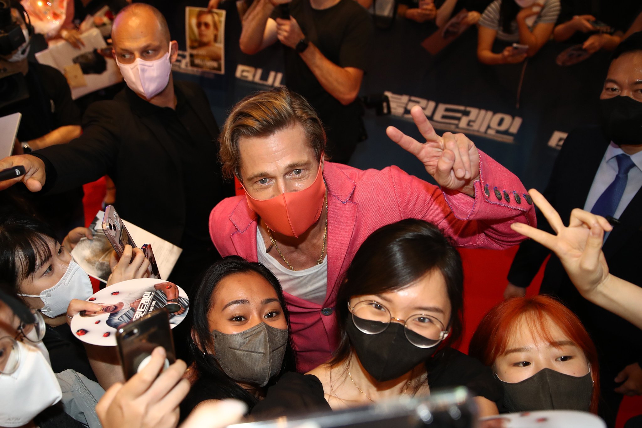 On The Red Carpet on Twitter "Brad Pitt poses with fans at the "Bullet