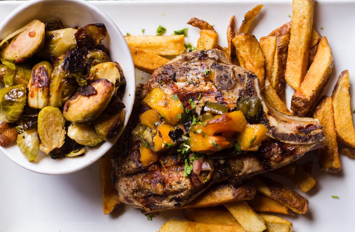 StockyardBurger's tweet photo. Chop Chop - it's almost quittin' time! #peach #porkchop #chops #StockyardBurgersandBones #Friday #weekend #clockout https://t.co/6DjtWJR7PW