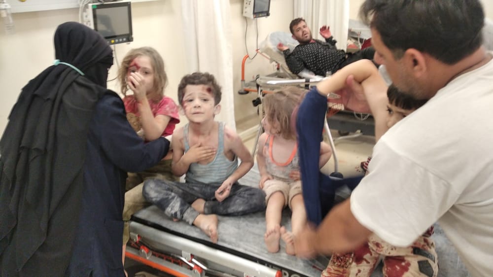 VoicesForum's tweet photo. Today, 14 persons, including many women and children, lost their lives, and over 34 were wounded when the city of Al-Bab was bombarded in northern Syria.  This comes at a time when many parties are trying to claim that #Syria is Safe to return to. /1 https://t.co/haQA3TVYm0