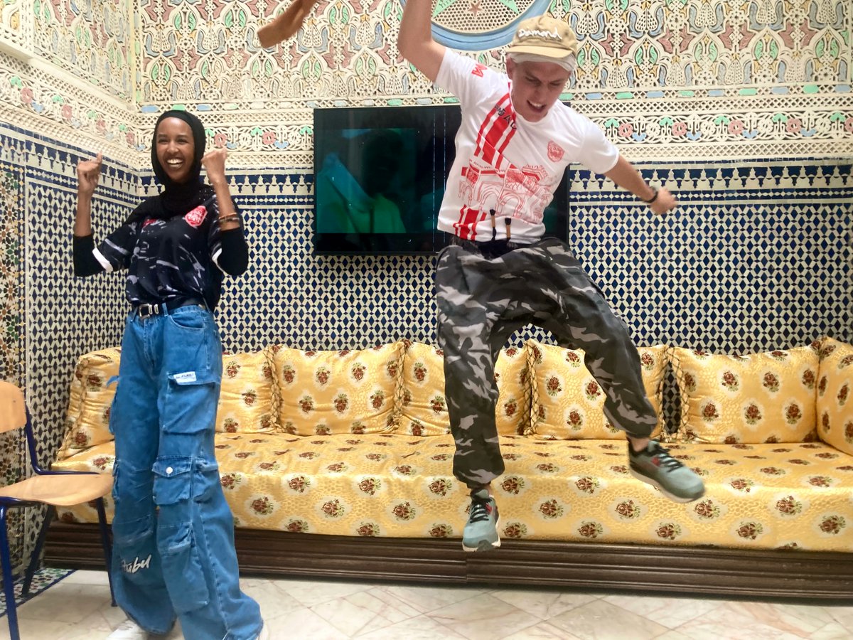 CLSscholarship's tweet photo. #CLSArabic scholars Matthew and Shammis perform a rap remix of a Nazar Qabbani poem with an epic outro! We can feel the electric energy in the room! #CLS22 #ExchangeOurWorld @ECAatState https://t.co/jbLeqnv2wJ