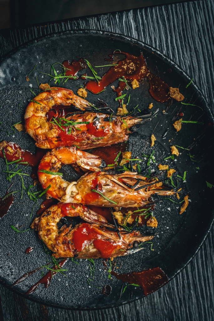 Mediterranean tiger prawn. It’s time to spice up your weekend. Cooked in the fire and smothered in a delicious brava sauce, with crispy onions for a little extra crunch. 

Hit the link in bio to dine with us this weekend.