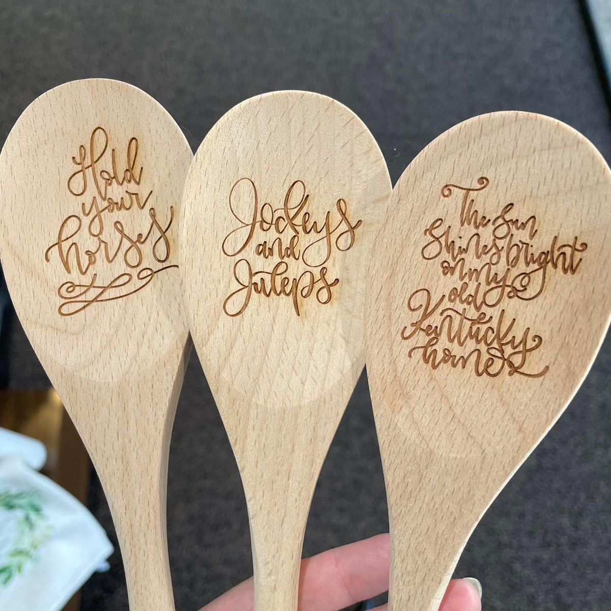 J_Schrecker's tweet photo. Need a new wooden spoon for your pitchers of iced tea, lemonade, etc.? Check out these with a Kentucky theme! Laser engraved. 

Choose from:
- Hold your horses
- Jockeys and juleps
- The sun shines bright on my old Kentucky home

See these and more at https://t.co/DTsmBsa3W7 https://t.co/YXWdT6wGU1