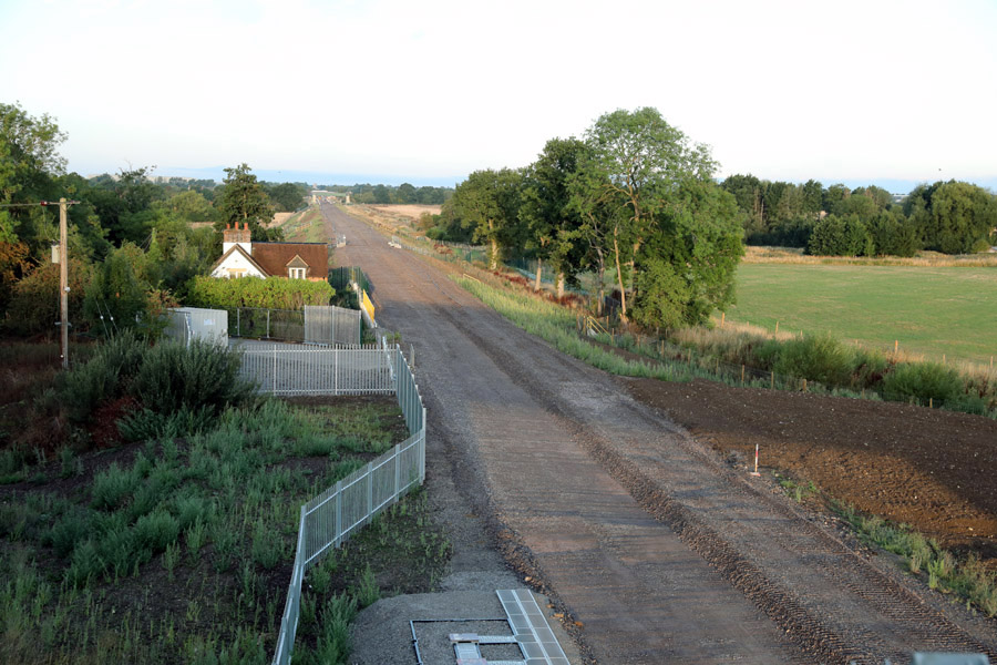 Marshrail's tweet photo. @eastwestrail Great to see @MarkMjames92 today at Bicester. Dawn saw me at the new Launton bridge OXD34A. Views east &amp; west with the former Launton level crossing now vanished under the embryonic trackbed. @bicesternews @VolkerRailUK engineers brilliant as ever. @RailwayMagazine https://t.co/LJW5wsowj5