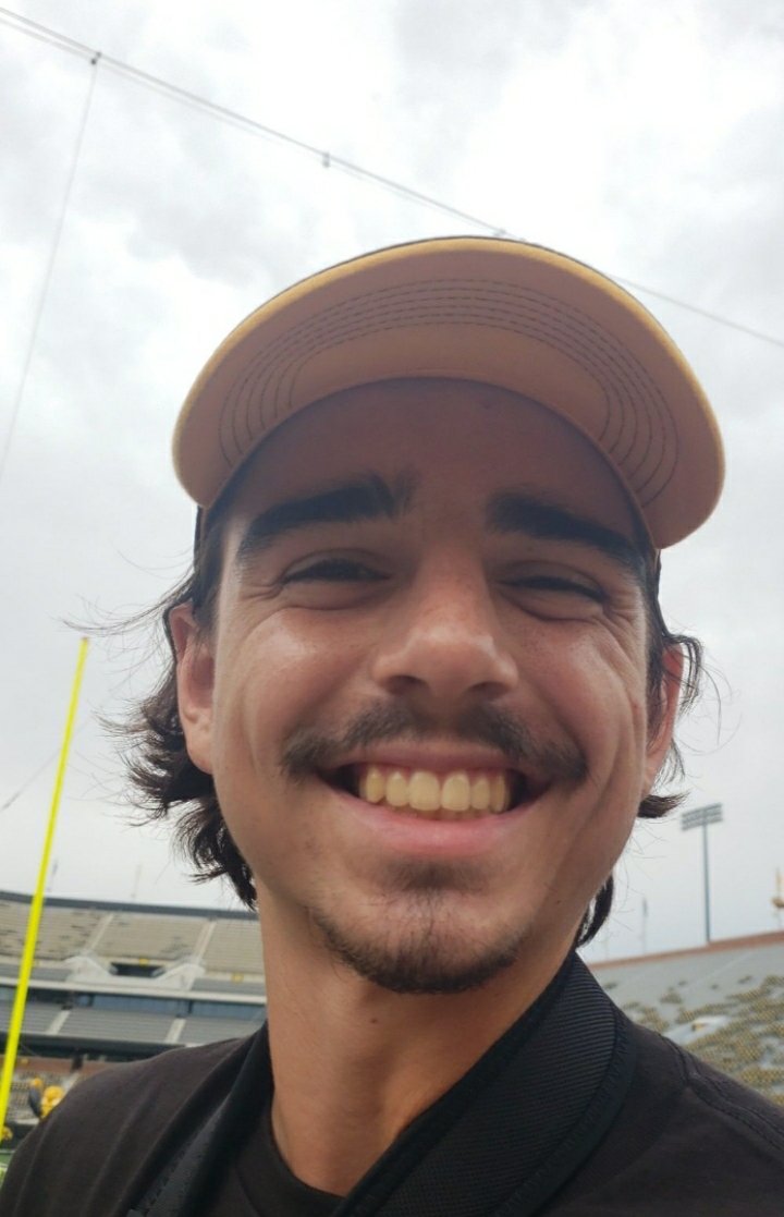 GabeHache's tweet photo. It's a beautiful day at Kinnick stadium! 🏈! Here with my son Joseph who is a huge fan💛🖤
Let's go hawks! #kickoffatkinnick 
#GoHawks https://t.co/wuZUk0S6kh