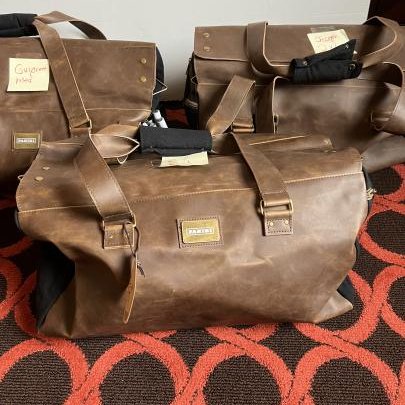 PaniniAmerica's tweet photo. Now THATS a swag bag - and its full of goodies! The #PaniniNFT Golden Ticket experience for @UFC 278 is kicking off, and we have a special guest joining our winners for dinner later tonight! 

The #NFT Utility coming this weekend is going to be 🔥🔥🔥 https://t.co/c5UOHxJcOr
