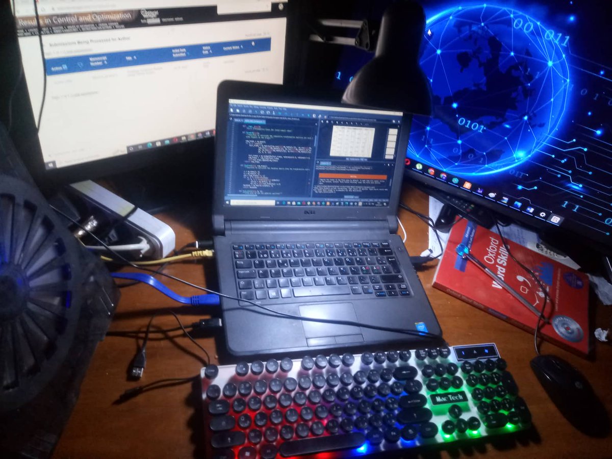 When it comes to Python, you need to have more than one screen  
My desk during my PhD preparation.