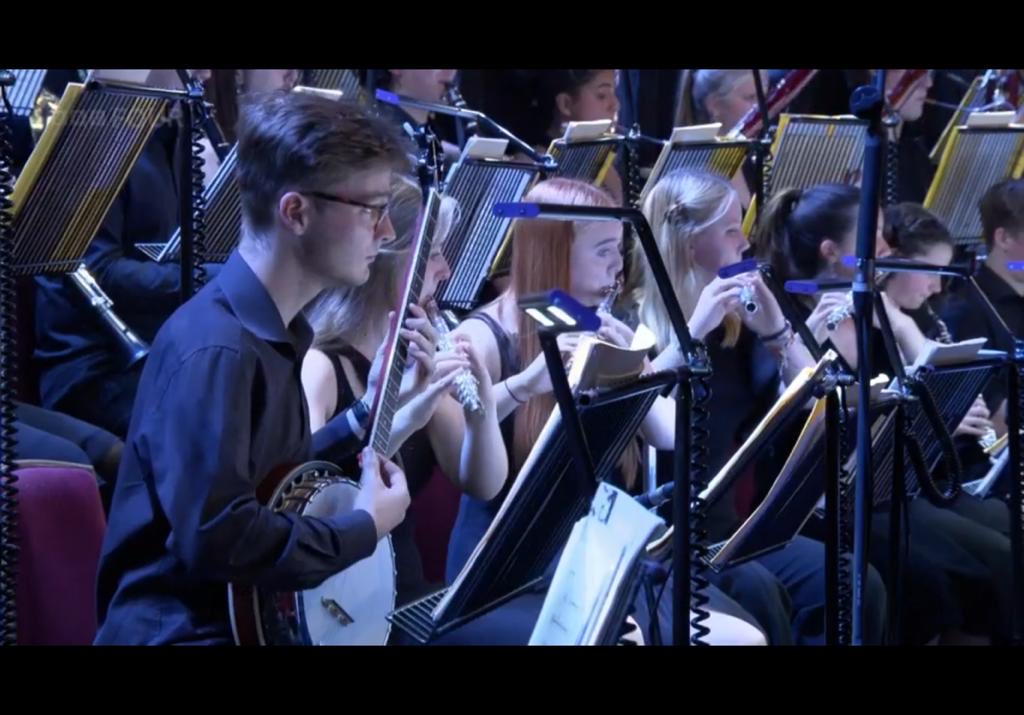 I am sure watching Tom on the TV will not be a one off, but here is the first time - guesting as a banjo player with <a href="/NYO_GB/">The National Youth Orchestra</a> in their recent magnificent prom! Available on BBC I player!