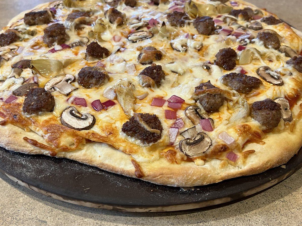 christianmjudd's tweet photo. On Tonight’s Menu: Pizza with Italian Sausage, Artichoke Hearts, Cremini Mushrooms, and Red Onions https://t.co/Y93kDkcJZV