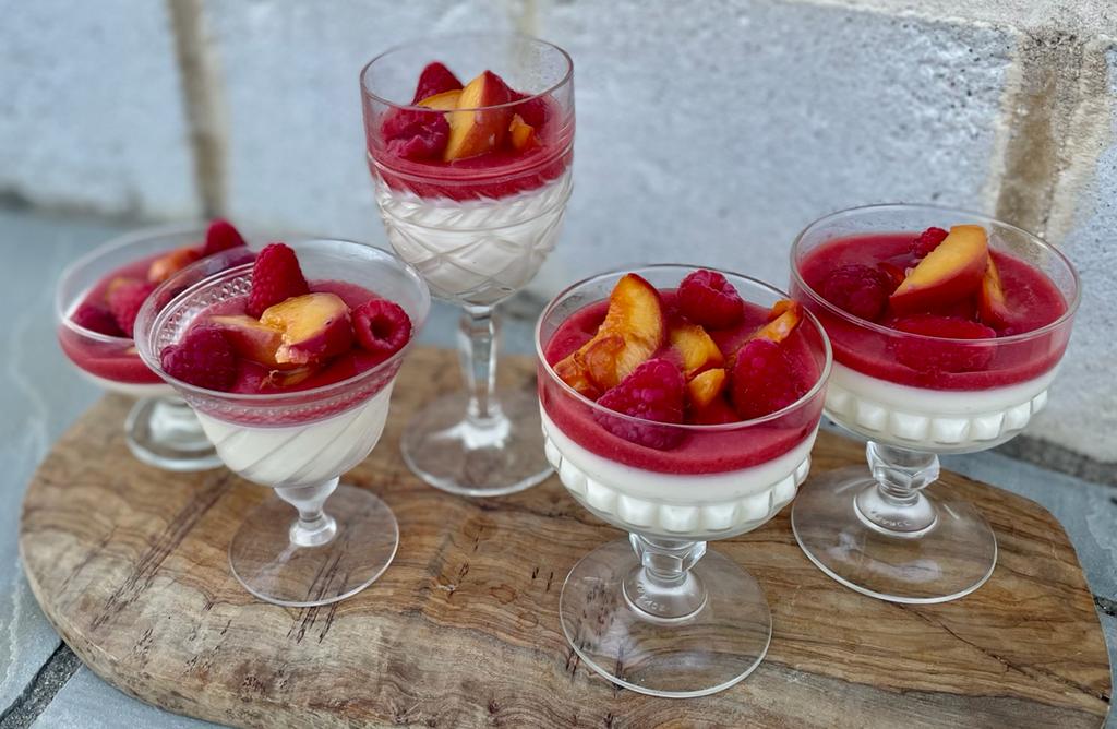 When the #weekend arrives &amp; a glass of bubbly just doesn’t hit the spot. 😉These are my rosemary #pannacotta with a raspberry &amp; rose coulis &amp; lightly poached peaches. A glass of pure deliciousness! Enjoy your #Saturday.
#weekendmood #dessert
