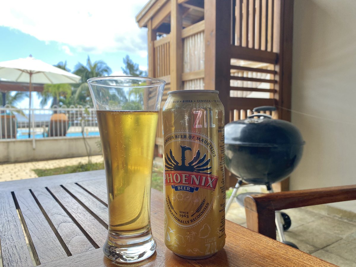WhiskyoftheWeek's tweet photo. Back to island time. Some Phoenix beer to watch the sun go down. A proper SA braai later. #ratherbeinmauritius #phoenixbeer https://t.co/h4ms6jrheQ