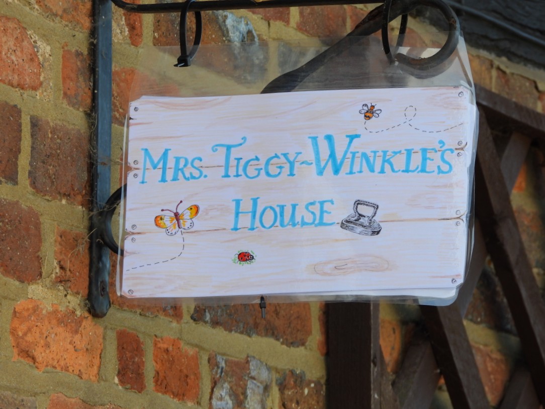 MrsWaterVole's tweet photo. Mrs Tiggy-Winkle at the Flamstead Scarecrow Festival yesterday https://t.co/Z98MPinVFL