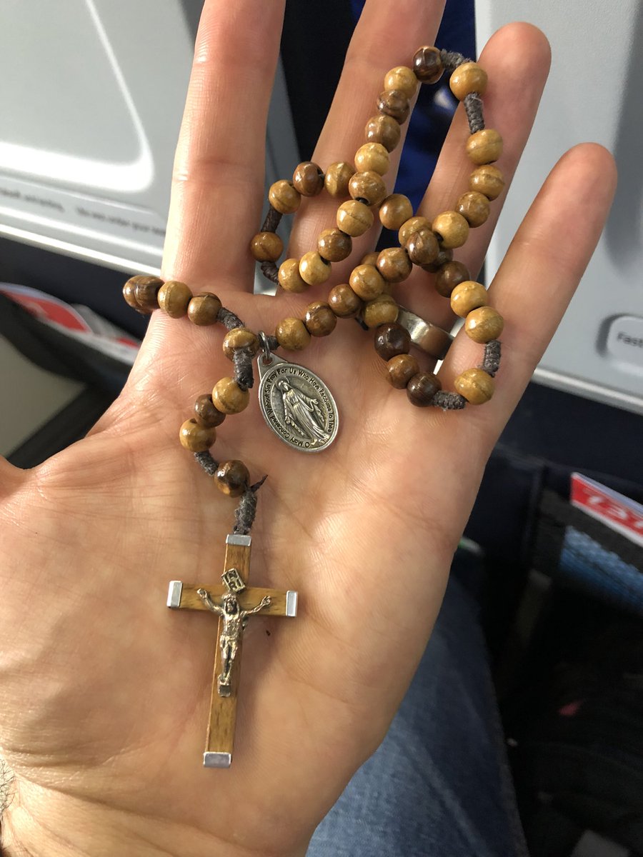 Got my “weapon” through airport security! #RosaryExtremist Hail, Holy Queen…