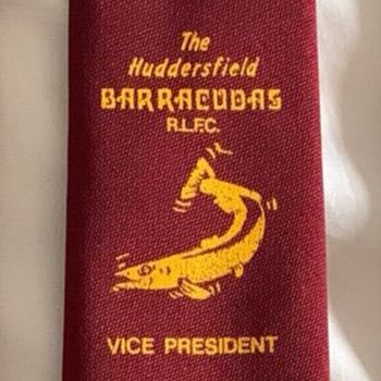 andrewfoster101's tweet photo. There’s #rugbyleague memorabilia, and then there’s this - a Huddersfield Barracudas official claret and gold tie. HT @StevenDagg1 https://t.co/QXlEe0mWst