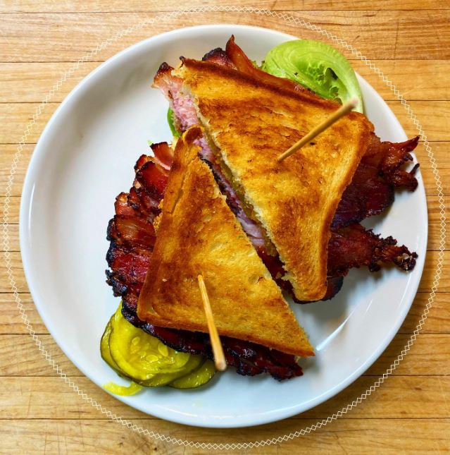 Celebrate National Bacon Lovers Day using your #DiningPassport! Photo featuring @stateparkbar Crispy Bacon Sandwich! tasteofcambridge2022.eventbrite.com