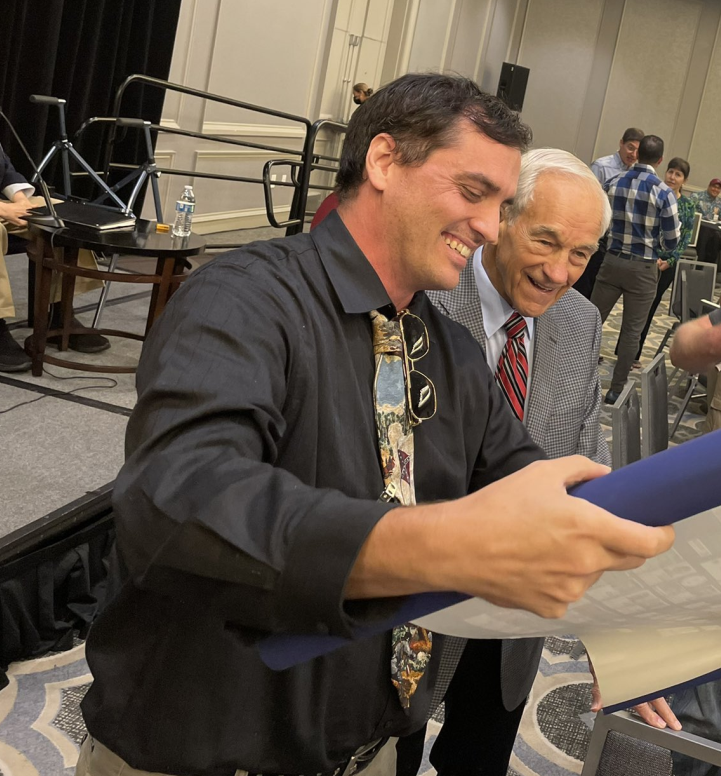 \"Happy birthday, Ron Paul!\", pictured here with an overt nazi:  