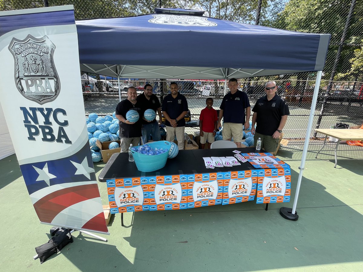 NYCPBA's tweet photo. Harlem knows #WeNeedPolice. Visit the @HARLEMWEEK Children’s Festival at Howard Bennett Playground today and stop by the PBA tent for basketballs honoring NYPD heroes and other giveaways. https://t.co/uNlWUsoKFX