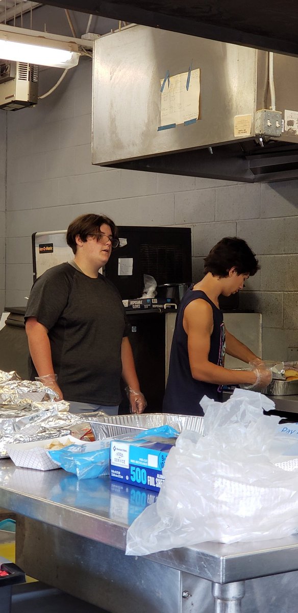 High school players getting it done in the concession stand today for the Paulding Youth Football Fall Classic