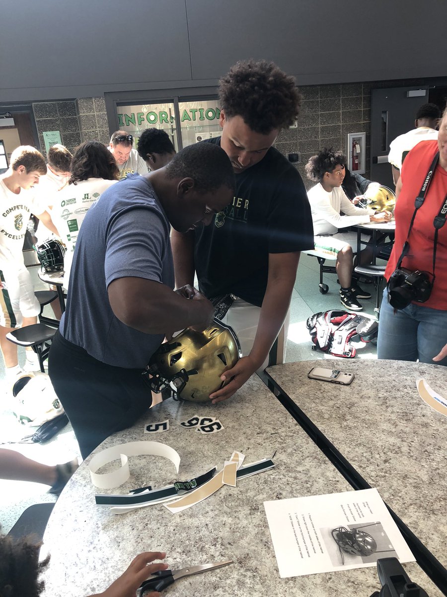 Sticker Ceremony! Parents put on the players decals- ready for scrimmage tonight!