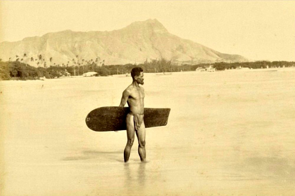 The first known photo of a surfer (Charles Kauha). Oahu, Hawaii 1898. Photo by Frank Davey