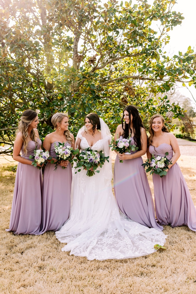 The beautiful bride + her stunning besties in purple! 💜💜 We love these lush color for all the spring and summer weddings. Such a fun unique POP of color! 💐⁣
⁣
Venue + Coordination ◦ <a href="/heartwoodhall/">Heartwood Hall</a>
Photographer ◦ Smash Studios Photography
Gown ◦ Low's Bridal