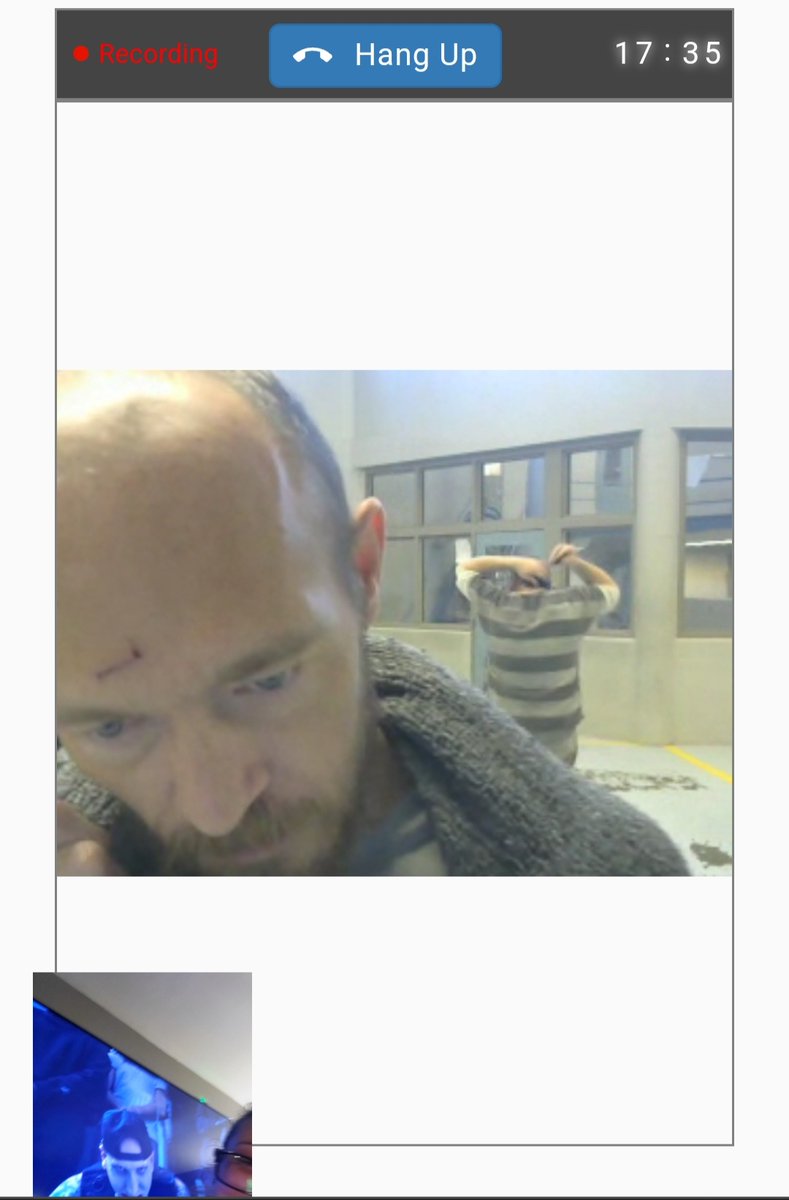 Love is holding the phone on the TV so he can hear/watch <a href="/sKitzKraven/">sKitz Kraven</a>