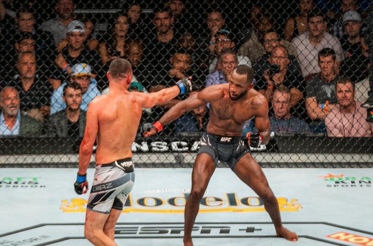 MMAHistoryToday's tweet photo. Leon Edwards in the final minute of his last fight versus Leon Edwards in the final minute of his rematch against Kamaru Usman.

There's nothing like the sport of mixed martial arts. https://t.co/lOgRX6b8Kq