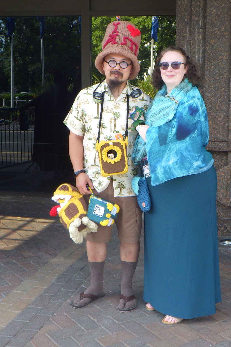 Gurdur's tweet photo. Twoflower (see link below) and partner, at the #DiscWorld 2022 convention. I was told he had knitted his entire costume as Twoflower himself
https://t.co/OjFeJFDWWq
: #2022DWcon, #DWcon https://t.co/IGYtXKGxZl