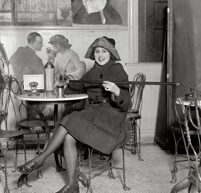 Historic Vids on Twitter "An unidentified woman uses a caneflask during the prohibition era
