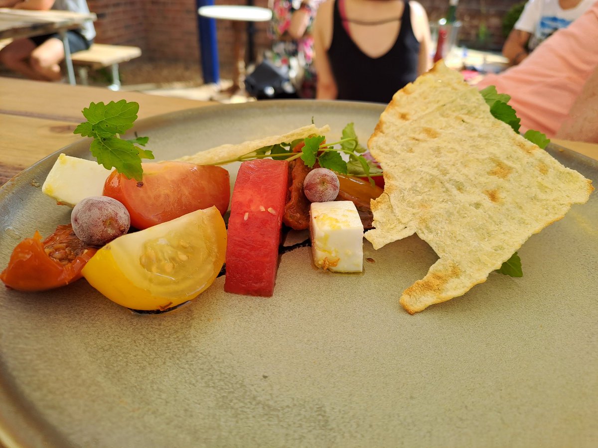TroupyTRFC's tweet photo. Bike ride, sea swim and a beautiful lunch at the @heroburnham - smoked mackerel and chorizo with pea fricassee, and heritage tomato salad with feta, compressed watermelon and frozen grapes #fwar #creatureofthedeep https://t.co/seD5qlhBPY