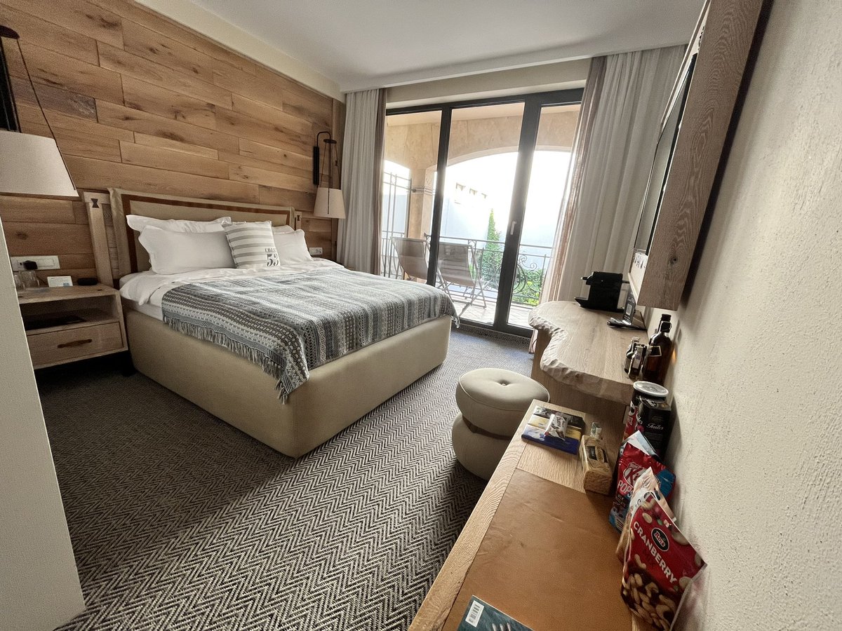 Blu Bay Hotel, Sozopol, Bulgaria.
Plug by bed, free wifi, good shower, LOADS of biscuits and snacks (nothing to suggest they are free or you pay for them)