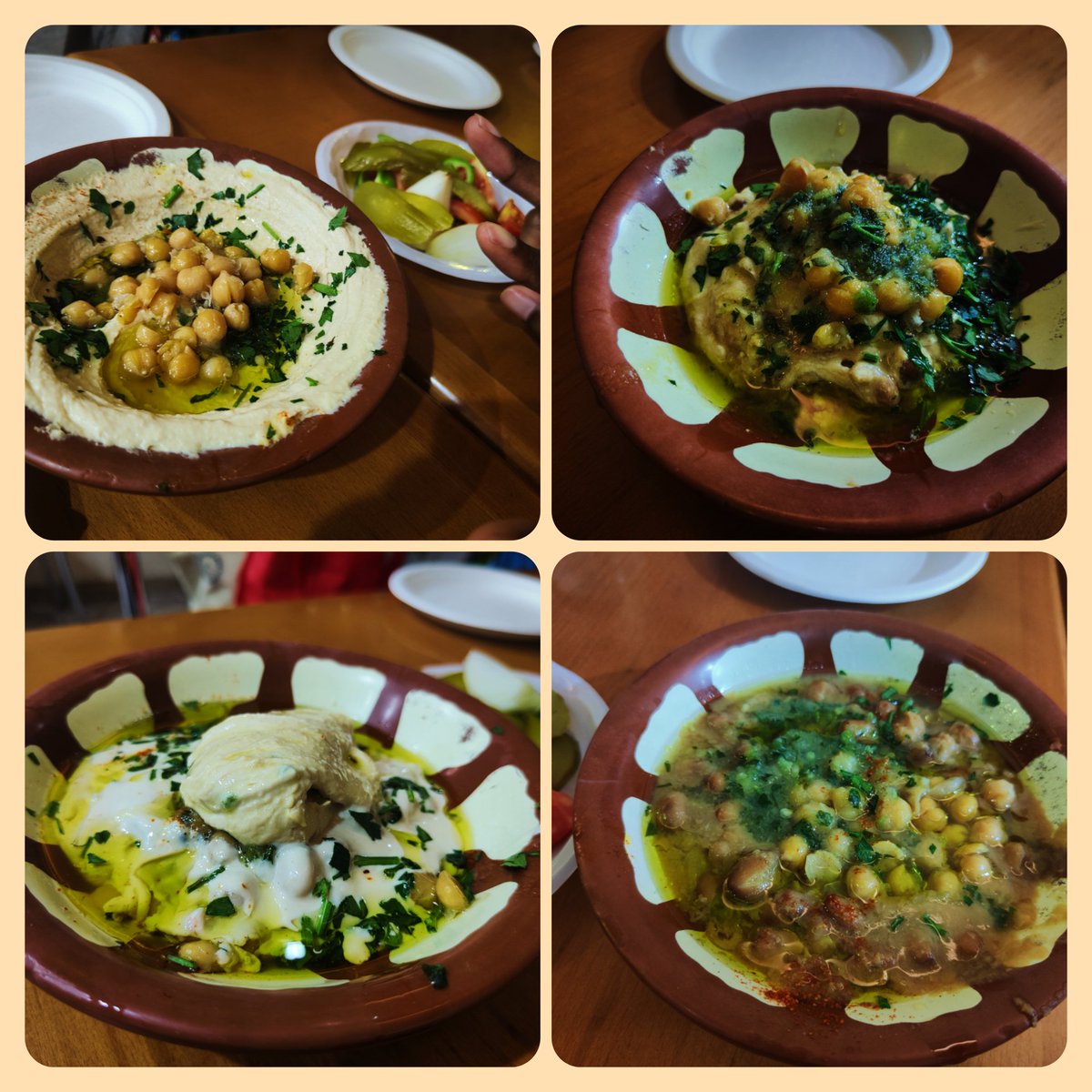 (from left to right) 
1. Classic humus
2. Qudsiya/makhloota (a mix of humus and fava beans)
3. Msabaha (reversed humus plate with mainly whole chickpeas topped with humus paste and tahini)
4. Full/fool (slow cooked fava beans with chili sauce) 
All topped with olive oil!