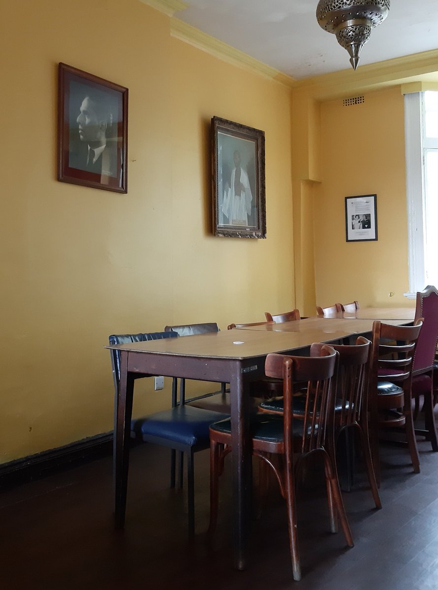 antiquarianism's tweet photo. The #IndiaClub was established in 1951 to promote Indo-British friendship and to offer young professionals affordable Indian food. The left-most photograph is a portrait of #KrishnaMenon, India's first High Commissoner and a founder of the club https://t.co/hQZjlPsTo8