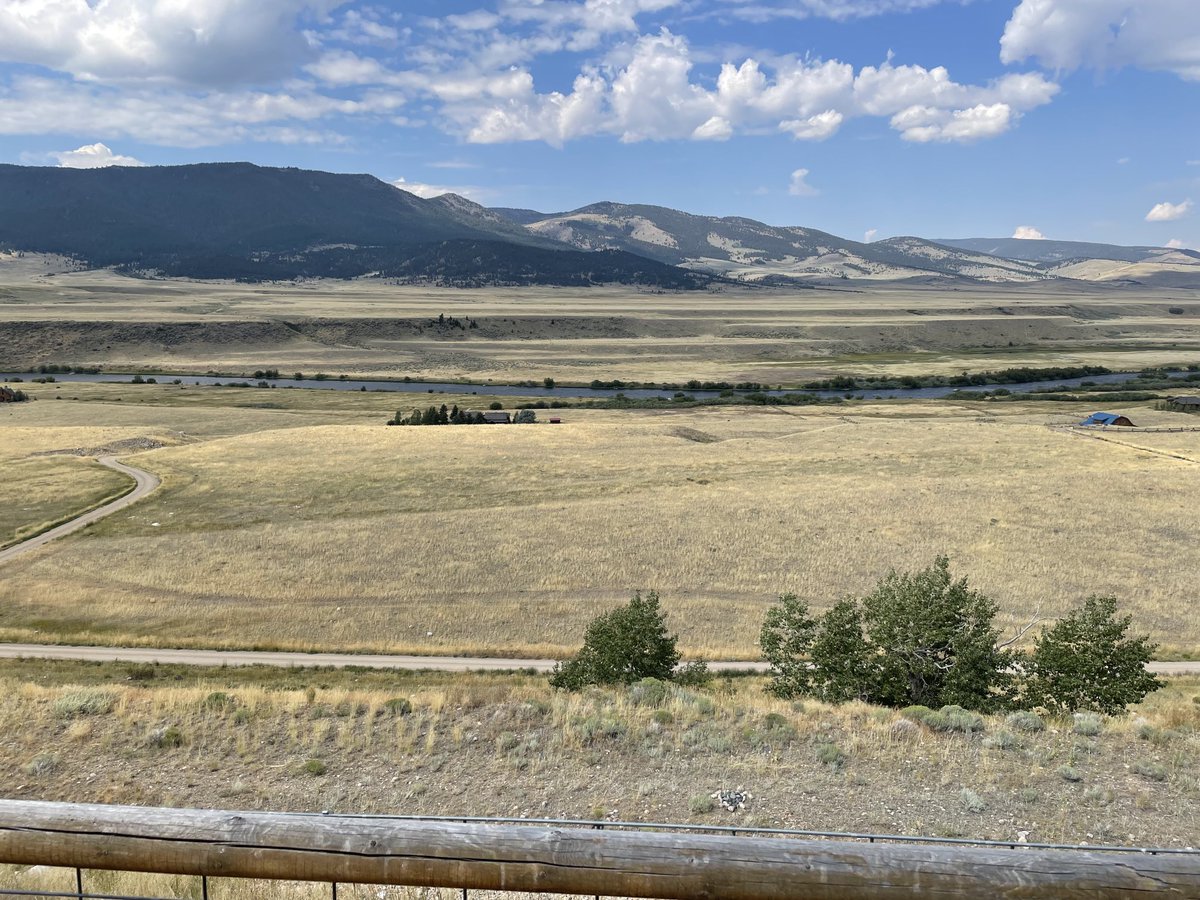 Chilling out on the deck of our cabin for the week, overlooking the Madison River near Ennis, Montana. Not a bad view!