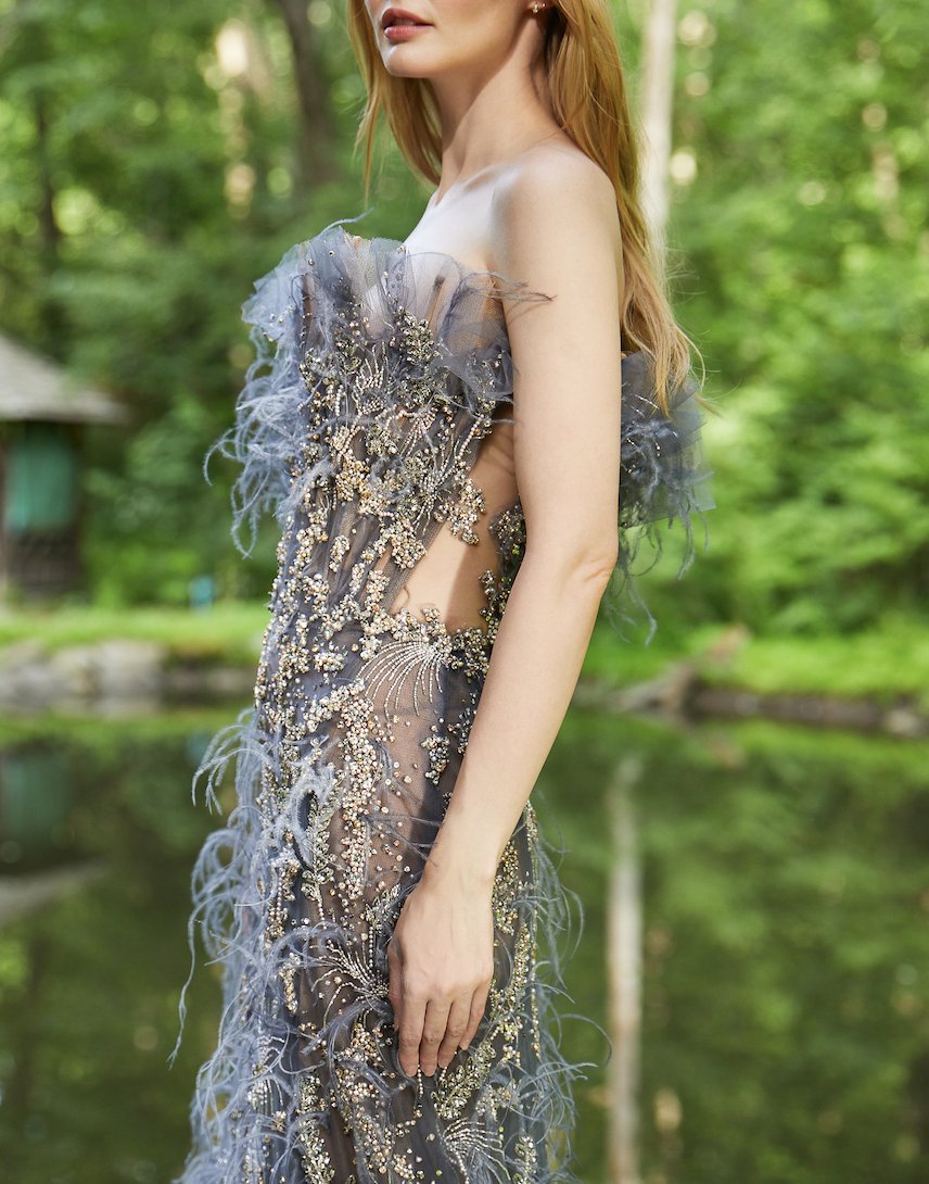 Swirling metallic fabric adorns a body-skimming silhouette like rushing water in Resort 2023 Marchesa.