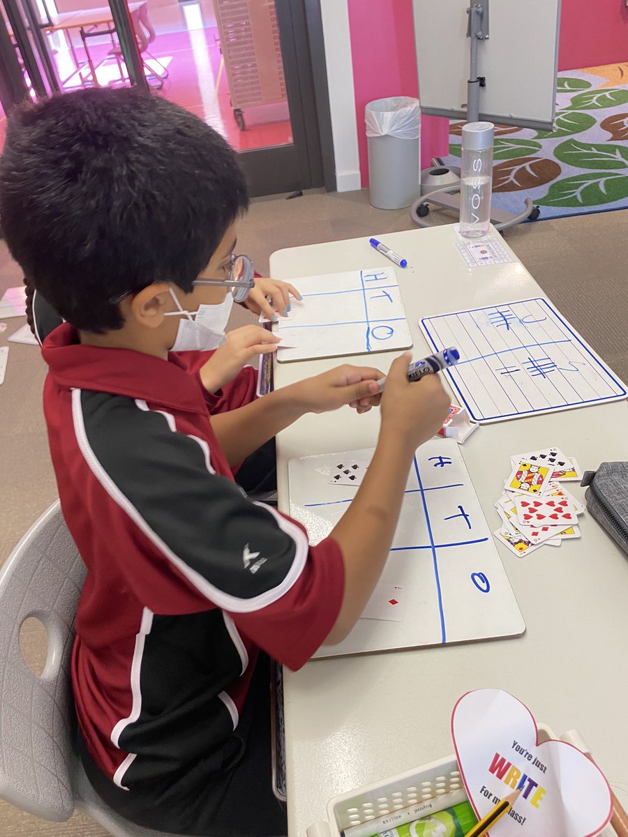 jucas34's tweet photo. Place value battle this morning. Who can make the greatest number? #mathgames https://t.co/VuHpE1C6d1