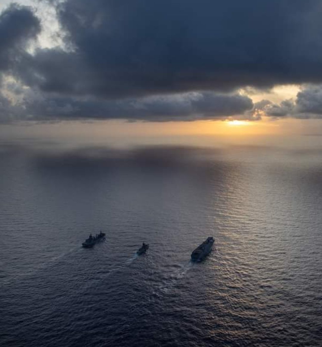 #HMASCanberra III sailed with #HMASSupply II and #HMASWarramunga (II) for the #HMASCanberra (I) 80th Anniversary Commemorative Service. 
500 members gathered on the flight deck for sunset service, where wreaths and flowers were laid for the 84 lives lost. @Australian_Navy