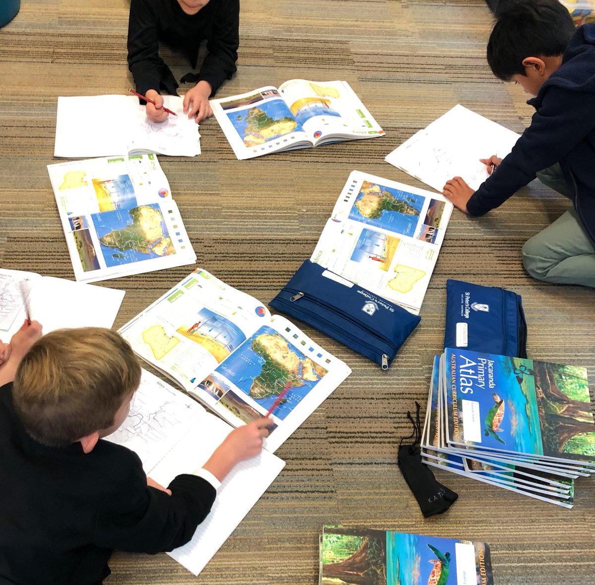 Atlas? What’s an atlas? 🌏📚 Yes kids this is what we used before Google Maps😆 So many intrigued minds! What a wonderful technology-free day we had developing #teamwork, #literacy and other key cross-curricular skills @SPSC_Adelaide <a href="/JGelsthorpe/">Jon Gelsthorpe</a> <a href="/jasmineftaylor1/">Jasmine Taylor</a> <a href="/BDStorer/">Ben Storer</a>