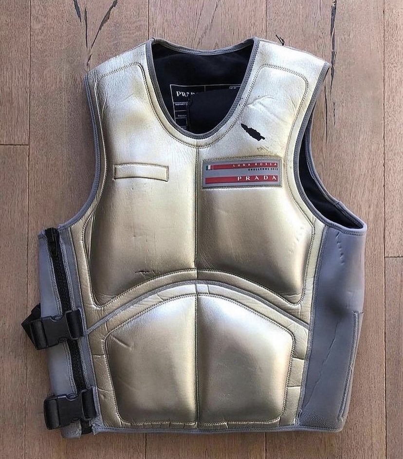 97kmmm's tweet photo. Prada 2013  ‘Luna Rossa’ Sailing Suit https://t.co/PY126gzhC4