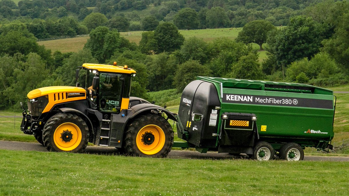 JCBagriculture's tweet photo. On your marks. A #JCB Fastrac 8330 towing a @KeenanSystem Diet Feeder at the JCB Estate. #FastracFriday #JCBmoment https://t.co/nUJHcIeqP6