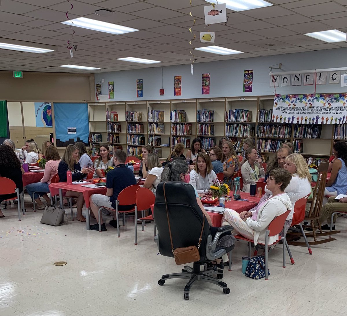 darryl_dr5's tweet photo. Staff at Rodgers Forge ES are pumped up and ready to start a new school year.  The theme is “we are all unique, but we all fit together” like in a puzzle.  Excellent team building activity and collaboration. Welcome back staff! https://t.co/CGwXEc5Epz