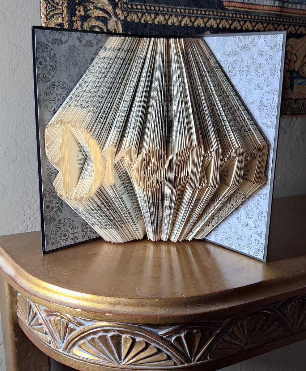 casady_sandra's tweet photo. Excited to share the latest addition to my #etsy shop: DREAM Folded Book Art https://t.co/9l0kon3IB0 #black #white #bedroom #contemporary #tabletop #paper #tabletopdecor #foldedbook #birthdaygift https://t.co/kUCzIa8s8H