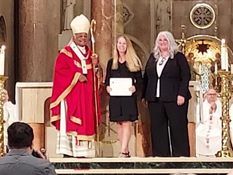 SMSCrusader's tweet photo. Our teachers &amp; staff joined @WashArchdiocese Catholic school leaders, educators, &amp; staff in celebrating the Opening School Mass at @MarysShrine this morning.
Congrats to Mrs. Netta Morelli! She was recognized for her 25 years of service @ADWCathSchools.     #ADWcommUNITY https://t.co/ibHSlyKagw