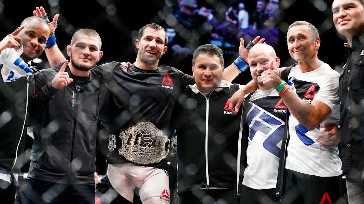 Daniel Cormier (@dc_mma) on Twitter photo When we were kings! Welcome to the world of retirement @lukerockhold I love these people. AKA forever <a href="/TeamKhabib/">khabib nurmagomedov</a> <a href="/akajav/">javier mendez</a> @crazybobcook <a href="/cainmma/">Cain Velasquez</a> RIP coach Javi #freecain When we were kings! Welcome to the world of retirement @lukerockhold I love these people. AKA forever <a href="/TeamKhabib/">khabib nurmagomedov</a> <a href="/akajav/">javier mendez</a> @crazybobcook <a href="/cainmma/">Cain Velasquez</a> RIP coach Javi #freecain