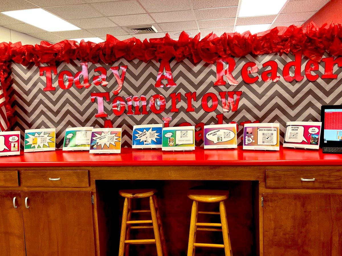New book display in the Ohatchee Library! Students can scan the QR code to watch a book trailer!! #OHSLibrary