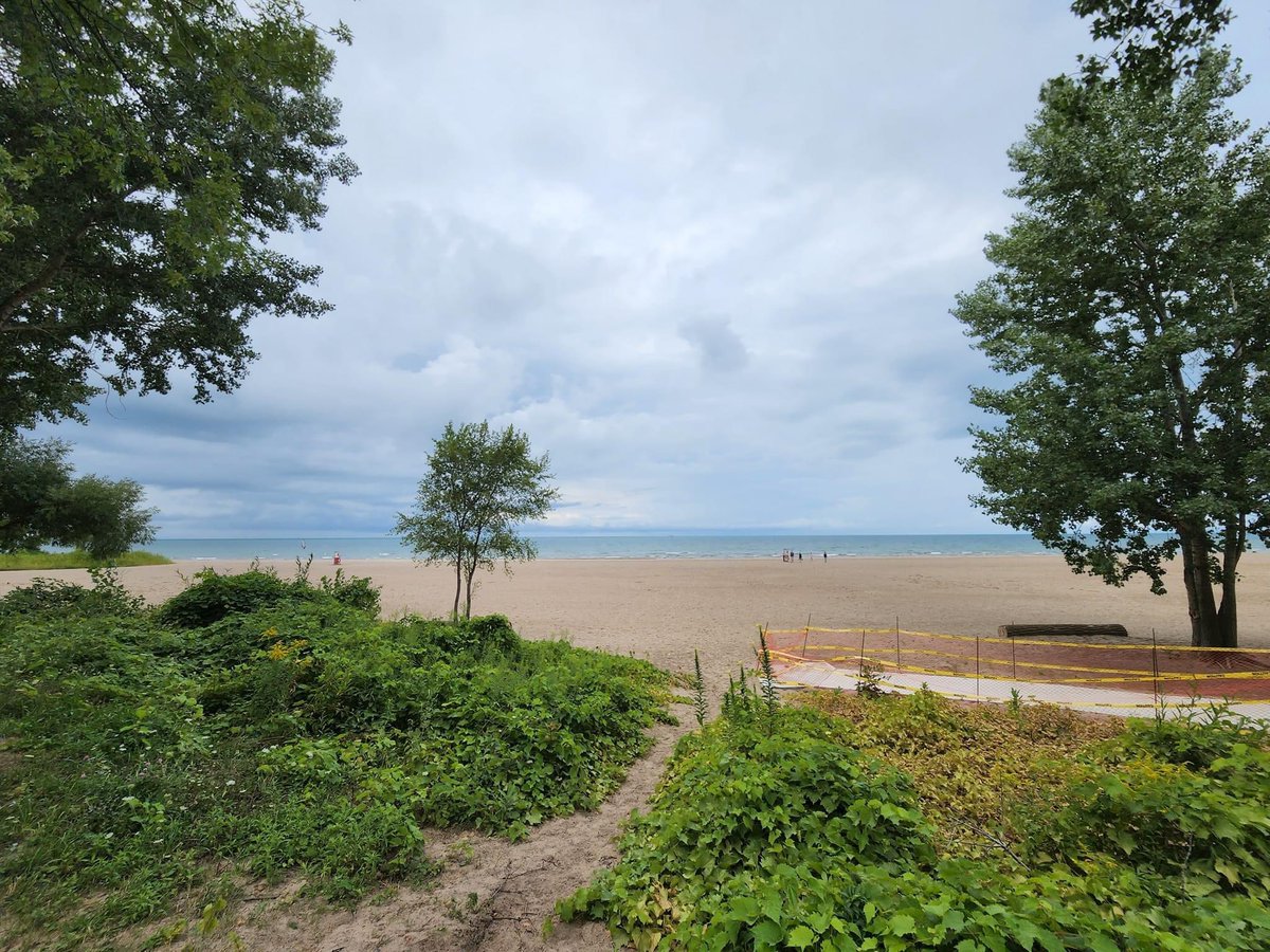 HopefulWaysOrg's tweet photo. Super-sized ships w/interesting artwork. Not a good angle, but good vision lets you appreciate it. Improving vision is what @HopefulWaysOrg is doing for the poor. Today's ride went N to Lake Ontario @ Sunset Beach, Port Weller Beach, Port Dalhousie &amp; back. The rain did not deter. https://t.co/XX5taEmXQU