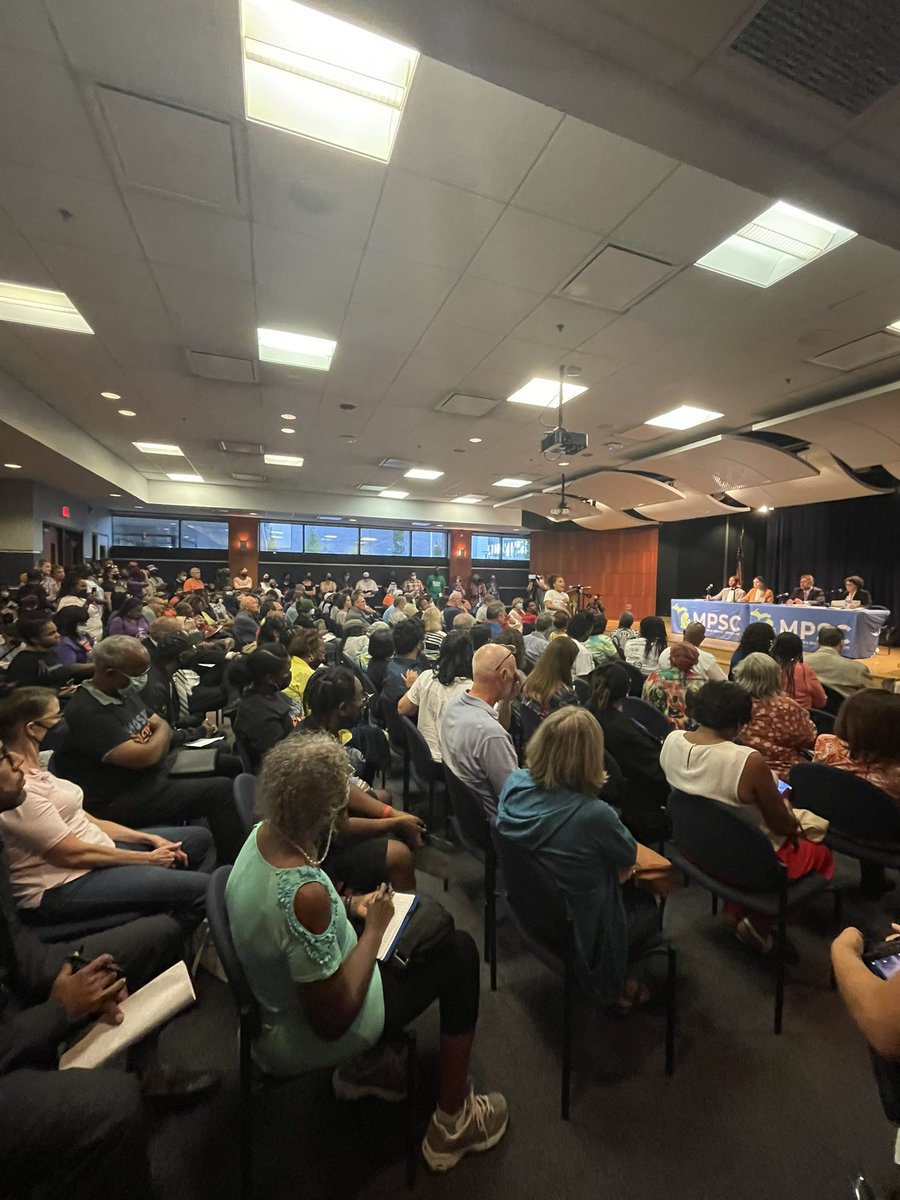 ArtReyesIII's tweet photo. Standing room only at the @MichiganPSC meeting tonight. The people are clear: no rate increases for investor-owned utility DTE Energy. Read why we’re pissed at https://t.co/3XJm8xfl0K @WeThePeople_MI @weareMEJC @Soulardarity @Detroit_Action @MichiganUnited @moses_mi @momjustice https://t.co/hxETd9UEJ7
